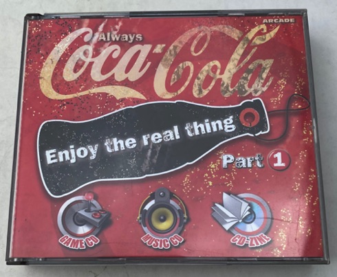 26115-1 € 6,00 coca cola cd enjoy the real thing.jpeg